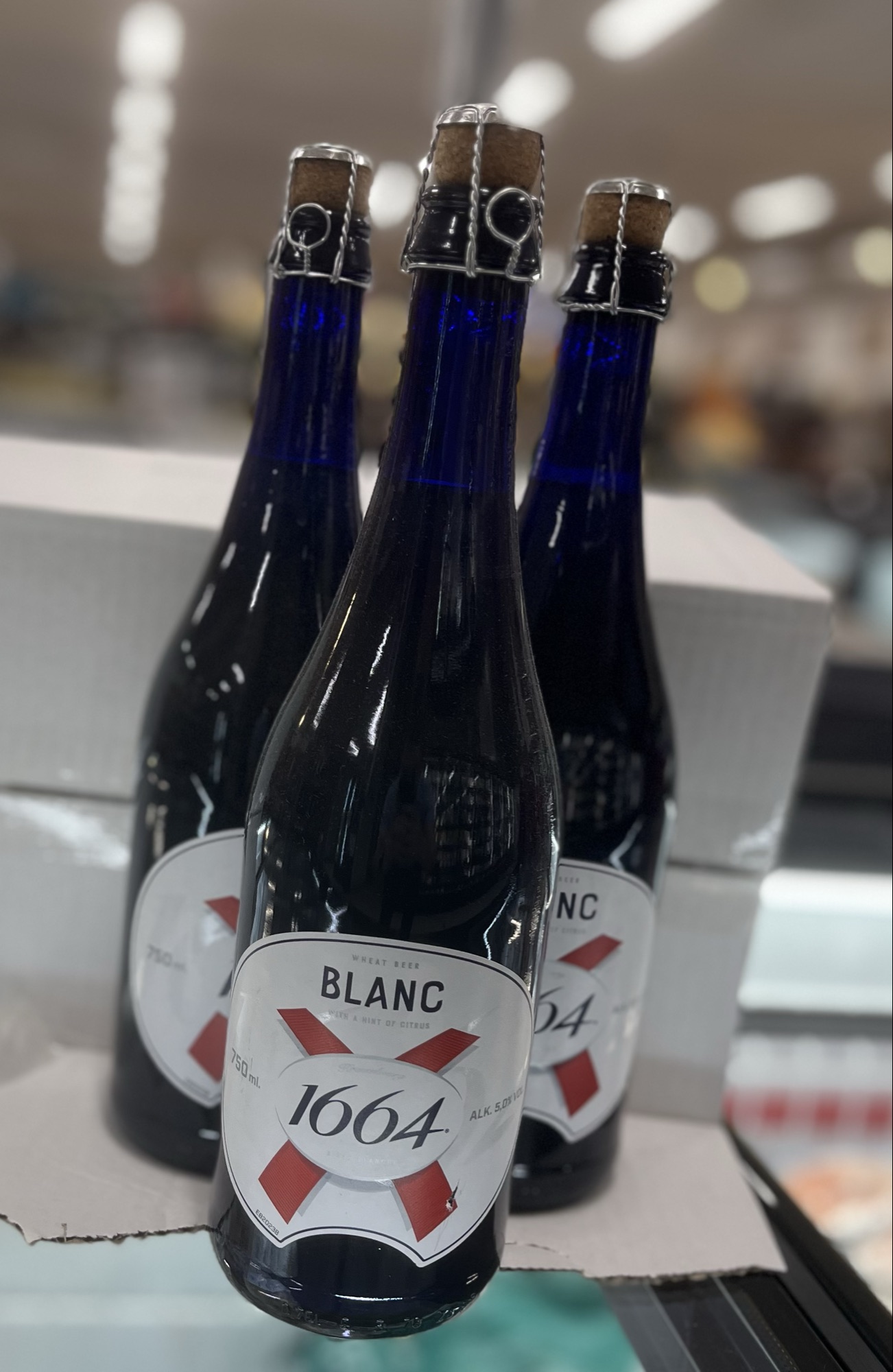 De flotte 1664 Blanc flasker